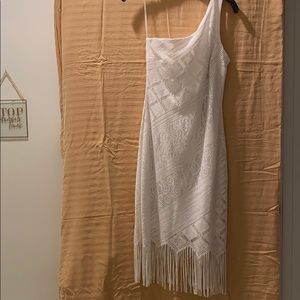 All white Crochet dress with long fringes.